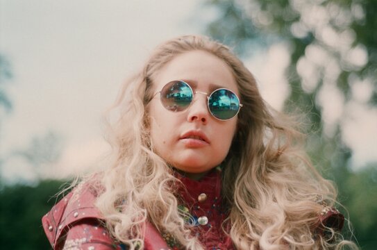 A blond woman with vintage glasses