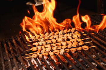 Smoked mussels and coals burning in a fireplace