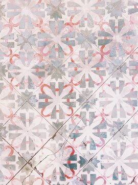 Vintage pink painted floor tiles