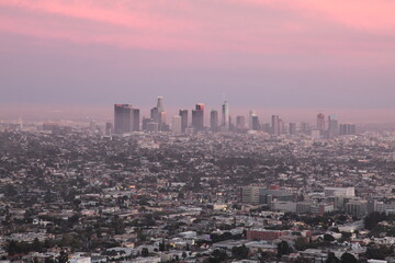 View of Downtown Los Angeles skyline under sunset seen from Griffith Observatory in California, USA