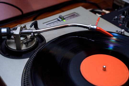 Close up of a Dj equipment playing record