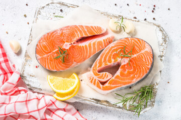Salmon steak fresh fish with spices top view.