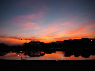 Naklejka premium A construction during the sunset on the mountain