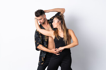 Couple dancing over isolated white background