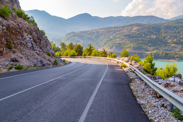 Driving through the mountain highway near a beautiful Green Canyon at Antalia province, Turkey.