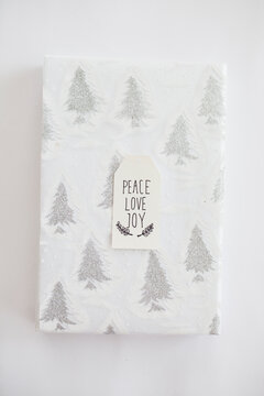 Wrapped Christmas gift on a white background