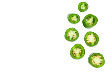 sliced jalapeno peppers isolated on white background. Green chili pepper. Capsicum annuum. top view