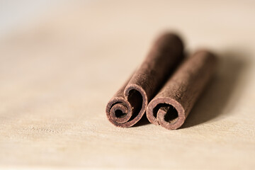 Cinnamon sticks on wooden tabletop