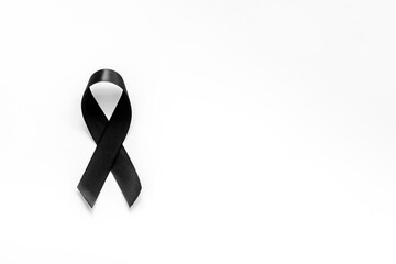 Black ribbon as mourning symbol top view