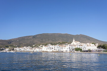 Fototapeta na wymiar CADAQUES, SPAIN-AUGUST 8, 2020: Panoramic view of the City in the moning from the sea.