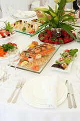 Banquet table for a holiday with festive dishes
