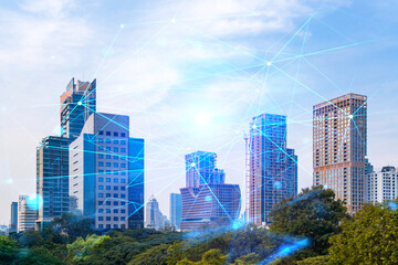 Fototapeta na wymiar Abstract technology icons hologram over panorama city view of Bangkok, Asia. The concept of people networking and connections. Double exposure.
