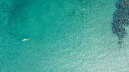 Sea aerial view, The color of the water and beautifully bright. The beach with rocky mountains and clear water of Thailand ocean on a sunny day. Landscape background. © No-Te