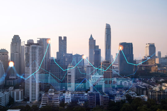 Market behavior graph hologram, sunset panoramic city view of Bangkok, popular location to achieve financial degree in Asia. The concept of financial data analysis. Double exposure.
