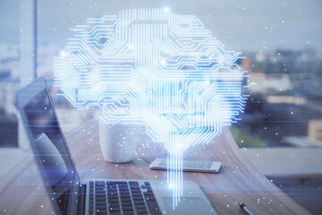 Multi exposure of work space with computer and human brain hologram. Brainstorm concept.