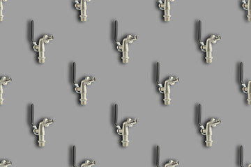Chrome water tap seamless pattern isolated on gray background.