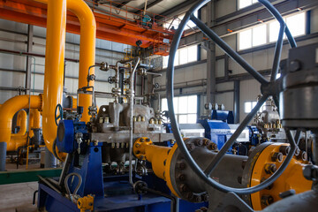 Aktobe region/Kazakhstan - May 04 2012: Gas power station on oil refinery plant. High-pressure yellow gas pipeline and valve armature