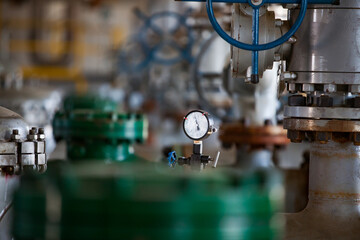 Aktobe region/Kazakhstan - May 04 2012: Oil refinery plant. Gas power station. pressure gauge (manometer) Industrial abstract background.