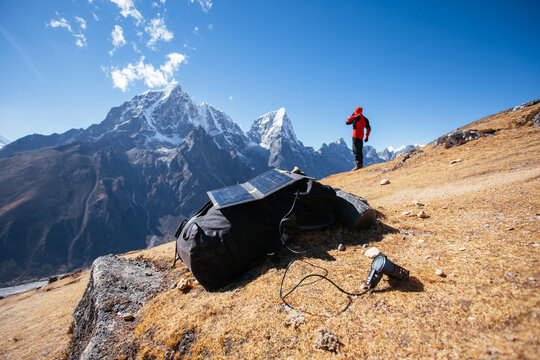 Man talking on his cellphone in mountain
