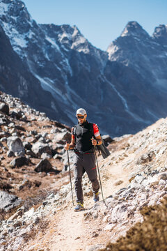 Man hiking on the way to mountain peak