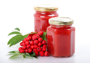 Jam from red rowan on a white background
