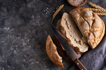 Homemade gluten free bread on a napkin on the kitchen table
