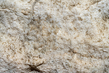 Natural background of light marble with a non-uniform texture