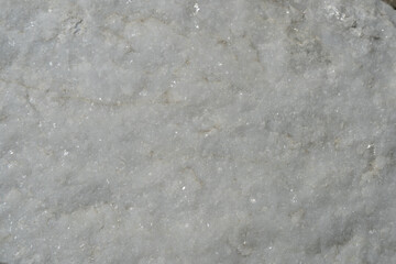 Natural background of light marble with a non-uniform texture