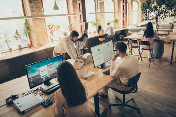 Nice attractive confident focused skilled people analyzing finance potential result investment money capital at modern industrial loft brick open space style interior workplace workstation - Powered by Adobe