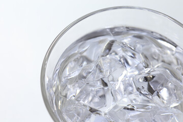 water with ice cubes in glass