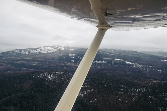 Aerial view from Cessna cockpit on rural scene in northern Idaho