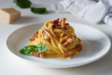 Homemade pasta Carbonara on a light background