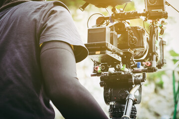 Film industry. Filming with professional camera background