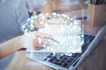 Multi exposure of writing hand on background with brain hologram. Concept of self learning.