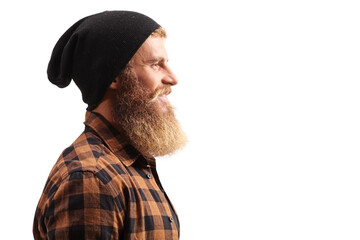 Close up profile shot of a hipster guy with beard and mustache wearing a black hat