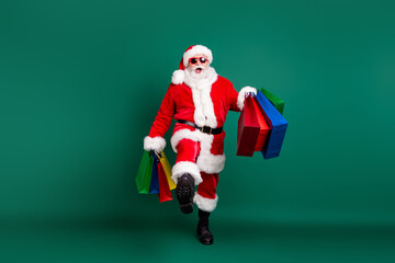 Full length body size view of his he nice fat overweight confident Santa father carrying delivering...