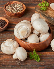 Fresh mushrooms on wooden table