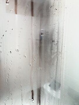 drops running down a mirror