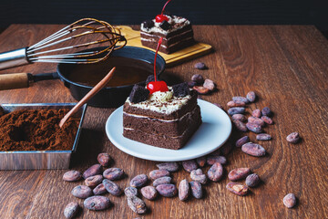 Homemade chocolate cake on a wooden table