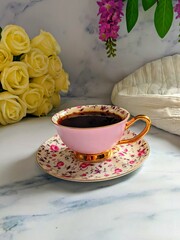 a cup of tea with flowers