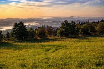 Fototapeta premium Early morning misty foothill landscape, Czech Paradise.