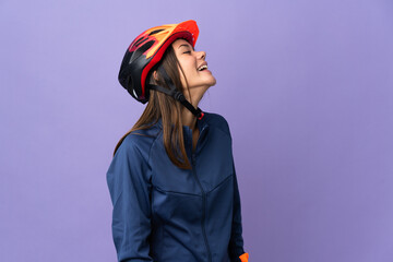 Teenager cyclist girl laughing in lateral position