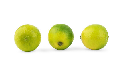 Natural fresh lime with water drops and sliced, green leaf isolated on white background