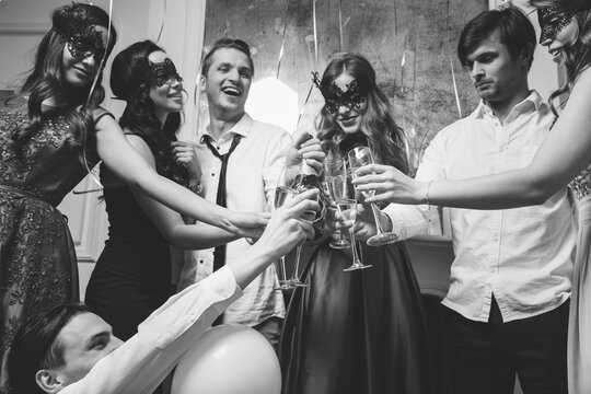 People clanging glasses