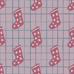 Pale seamless pattern with doodle pink christmas socks print. Chequered light purple background. Winter backdrop.