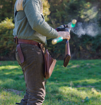 Cartridges coming out of a shotgun in a duck hunt