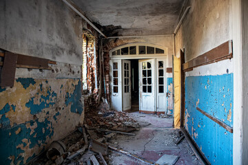 Doorway with beautiful doors in an old abandoned building