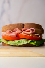 Sandwich jam tomato lettuce bread