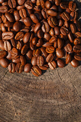 roasted Coffee beans on wood background