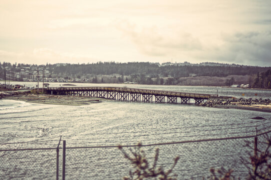 Bridge over the water on a cloudy day.